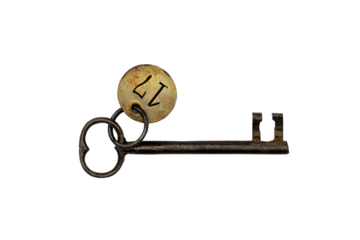 isolated ancient key, with metal pendant and the number 17