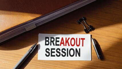 Breakout Session Meeting on Wooden Desk