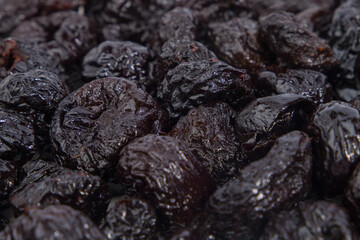 Prunes as a background, close-up, selective focus
