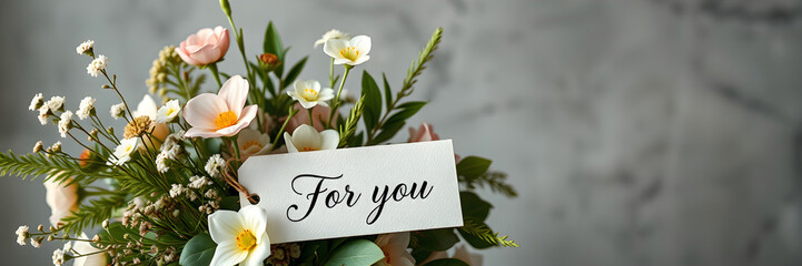 Delicate contemporary herbal bouquete with elegant calligraphy "For you" on tag. Floral greeting banner	
