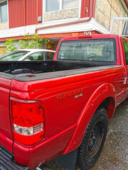 Rear View of a Red Sport 4x4 Pickup Truck