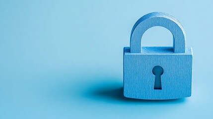Blue Wooden Padlock with Keyhole on Light Blue Background Symbolizing Security and Protection Concept