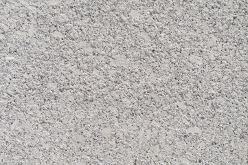 Texture of gray rough surface of a concrete wall