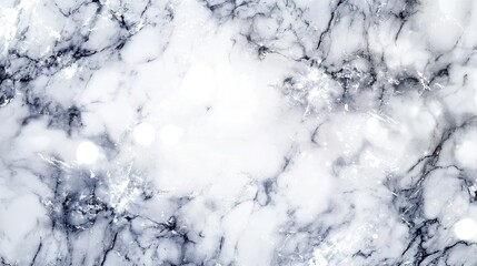 Elegant white marble texture with subtle gray veining and soft light reflections, ideal for backgrounds