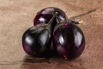 Raw violet and black eggplant