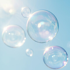 Naklejka premium soap bubbles on blue sky