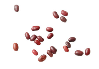 A bunch of red beans are scattered across a white background