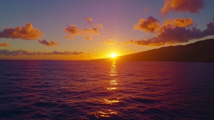 Obraz premium Sunset over calm water, vibrant colors, golden sun, clouds, tranquil scene