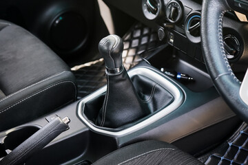 automatic transmission shift selector in the car interior. Closeup a manual shift of modern car...