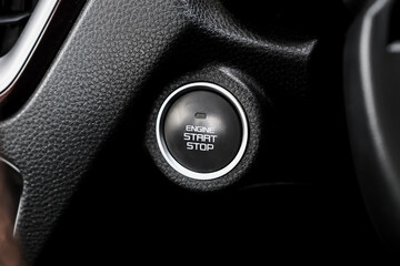 Close up engine car start button. Start stop engine modern new car button,Makes it easy to turn...