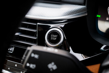 Close up engine car start button. Start stop engine modern new car button,Makes it easy to turn your auto mobile on and off. a key fob unique ,selective focus