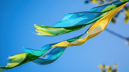 Torn ribbons, windblown, outdoor, sunny sky, festive event