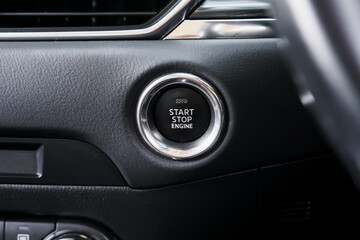 Close up engine car start button. Start stop engine modern new car button,Makes it easy to turn...