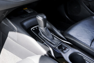 automatic transmission shift selector in the car interior. Closeup a manual shift of modern car...