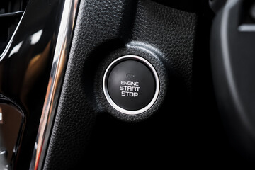 Close up engine car start button. Start stop engine modern new car button,Makes it easy to turn...