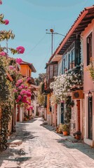 Fototapeta premium A street with small old houses with flowers 