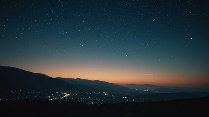 Fototapeta premium Starry night over a mountain town with a glowing horizon and serene landscape