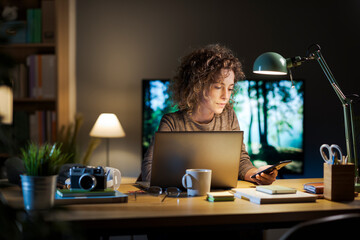 Woman using devices at home
