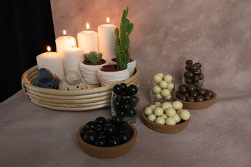 chocolate and caramel, round and delicious dessert standing in front of candlelight