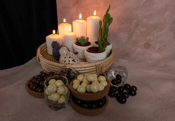 chocolate and caramel, round and delicious dessert standing in front of candlelight