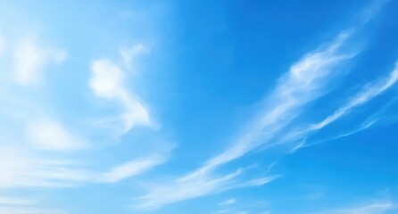 Serene Blue Sky with Wispy Clouds Creating a Calm and Peaceful Atmosphere