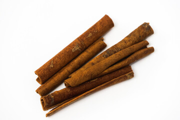 Cinnamon sticks on white background