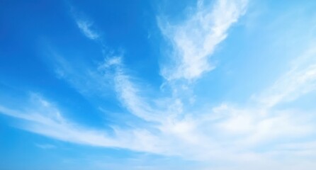 Fototapeta premium Serene Blue Sky With Wispy Clouds Creating a Peaceful Atmosphere