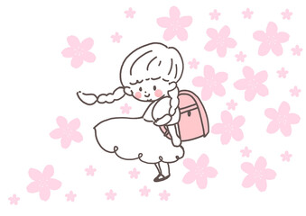 ピンクのランドセルを背負い、笑顔でこちらを見るおさげの女の子　入学式　桜　4月　春
