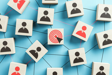 Wooden cubes with employee icons connected by lines on blue background, highlighting a target icon. 3D Rendering