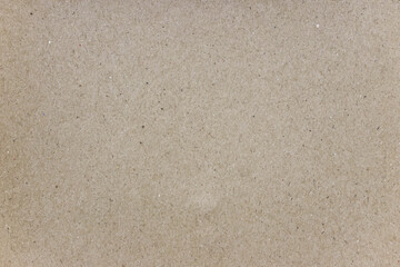 A sheet of brown recycled cardboard texture as background