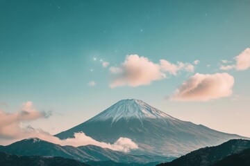 Fototapeta premium Mount Fuji rises majestically above clouds during sunrise in Japan, showcasing a breathtaking landscape