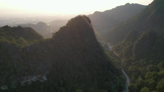 Aerial view from drone of the rural village in the mountains before sunrise
