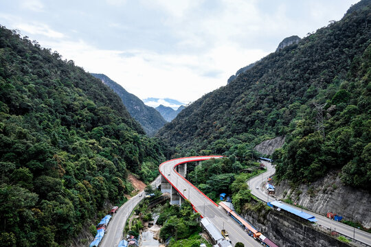 Aerial view of Kelok 9 or Kelok Sembilan, the iconic winding road in Lima Puluh Kota Regency, West Sumatera,Indonesia.