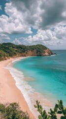 Beautiful beach with clear turquoise waters and soft sand under a cloudy sky in summer