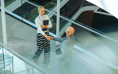 Professional business greeting in a modern corporate environment © Jacob Lund