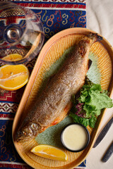 grilled trout with herbs and lemon sauce