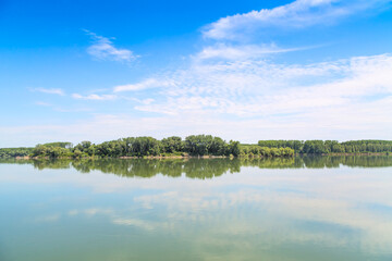 Reflection of trees and sky in the lake