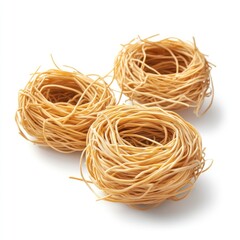 Three nests of pasta on white background, food photography for cookbook