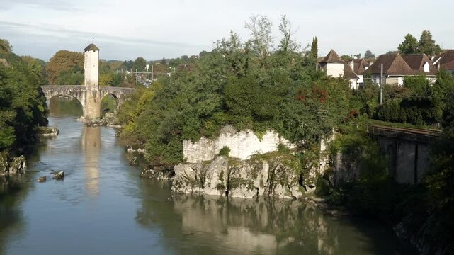 Overall view on the ancient bridge of Orthez crossing the river le Gave de Pau.