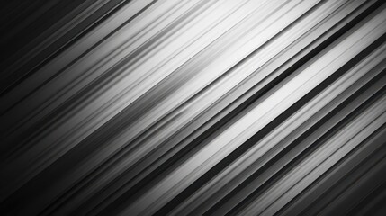Fototapeta premium Diagonal lines in shades of black and white create an intriguing abstract pattern. The contrast adds depth and texture, making it visually captivating