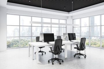 Modern white office space with rows of desks and computers, large windows overlooking a city skyline. 3D Rendering