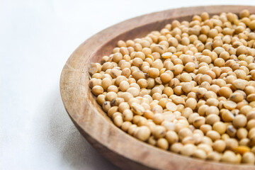close-up of a bowl of soybeans on a white background