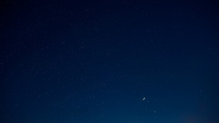 Moon with starry Milky Way background.
