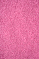 Fototapeta premium Pink fleece fabric texture, macro texture fleece pink fabric photo above as background