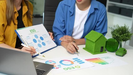 Engineer Teamwork Meeting, with partner on model building at company office working technology, Renewable energy-based green businesses and global warming.