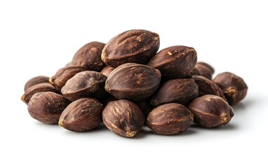 Fototapeta premium Pile of dark brown nuts isolated on white background. Possible use Food photography, stock image for a nut product