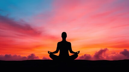 A silhouette of a person meditating against a vibrant sunset sky, evoking peace and tranquility.