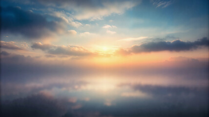 Dreamy sunrise over calm water with soft reflections