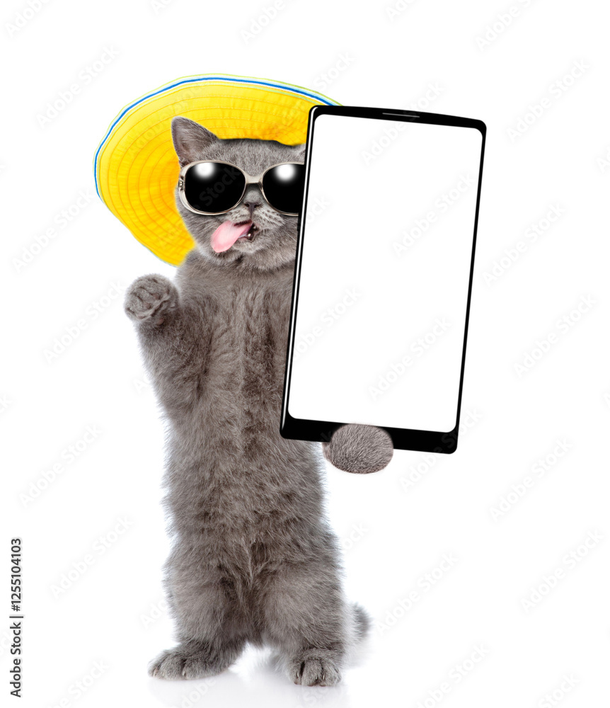Poster happy cat wearing sunglasses and summer hat standing on hind legs and showing big smartphone with wh