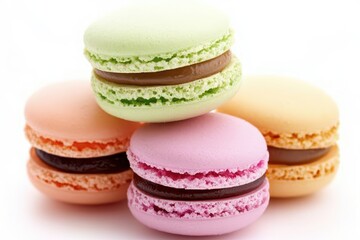 Fototapeta premium Colorful Macarons Stacked on White Surface for Sweet Treats Display